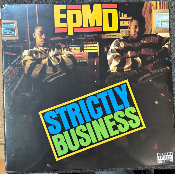 Vinyl record cover for EPMD's 'Strictly Business' with two men in a studio setting.