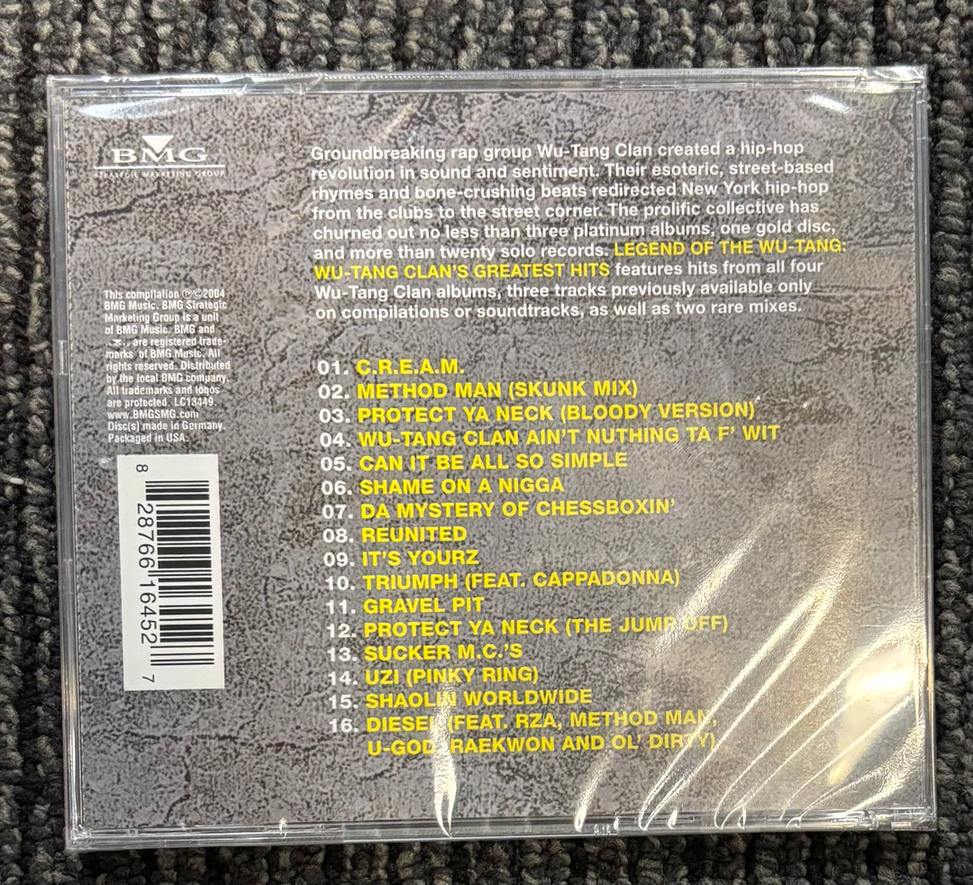 Back cover of a Wu-Tang Clan album with tracklist and album details.