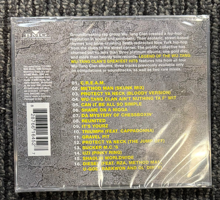Back cover of a Wu-Tang Clan album with tracklist and album details.