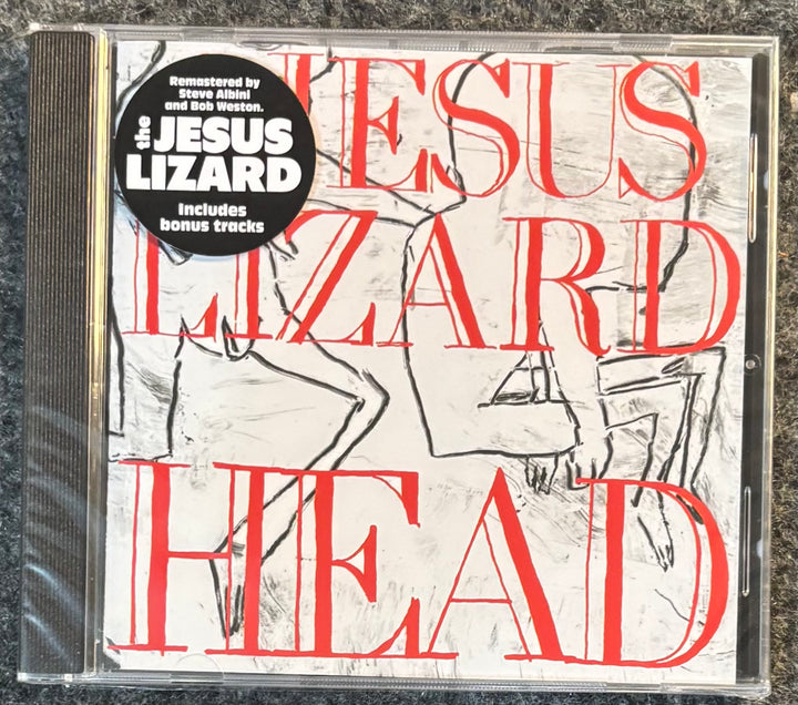 Jesus Lizard - Head CD album cover in jewel case, featuring large red text over a white sketch background with a black circular remaster sticker.