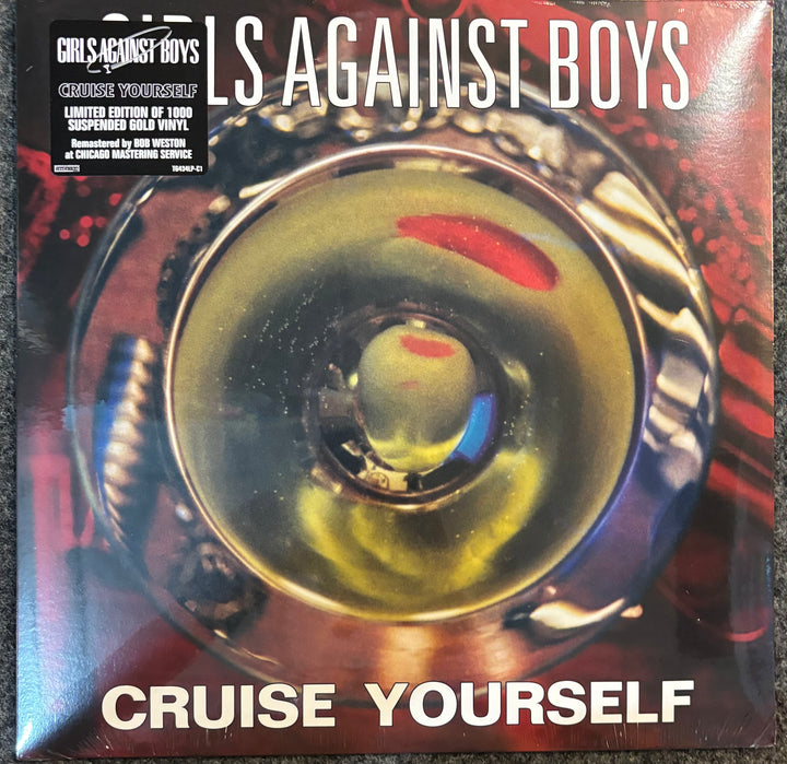Cruise Yourself limited edition vinyl record sleeve by Girls Against Boys, featuring a glossy reflection of an olive in a glass with red and yellow highlights.