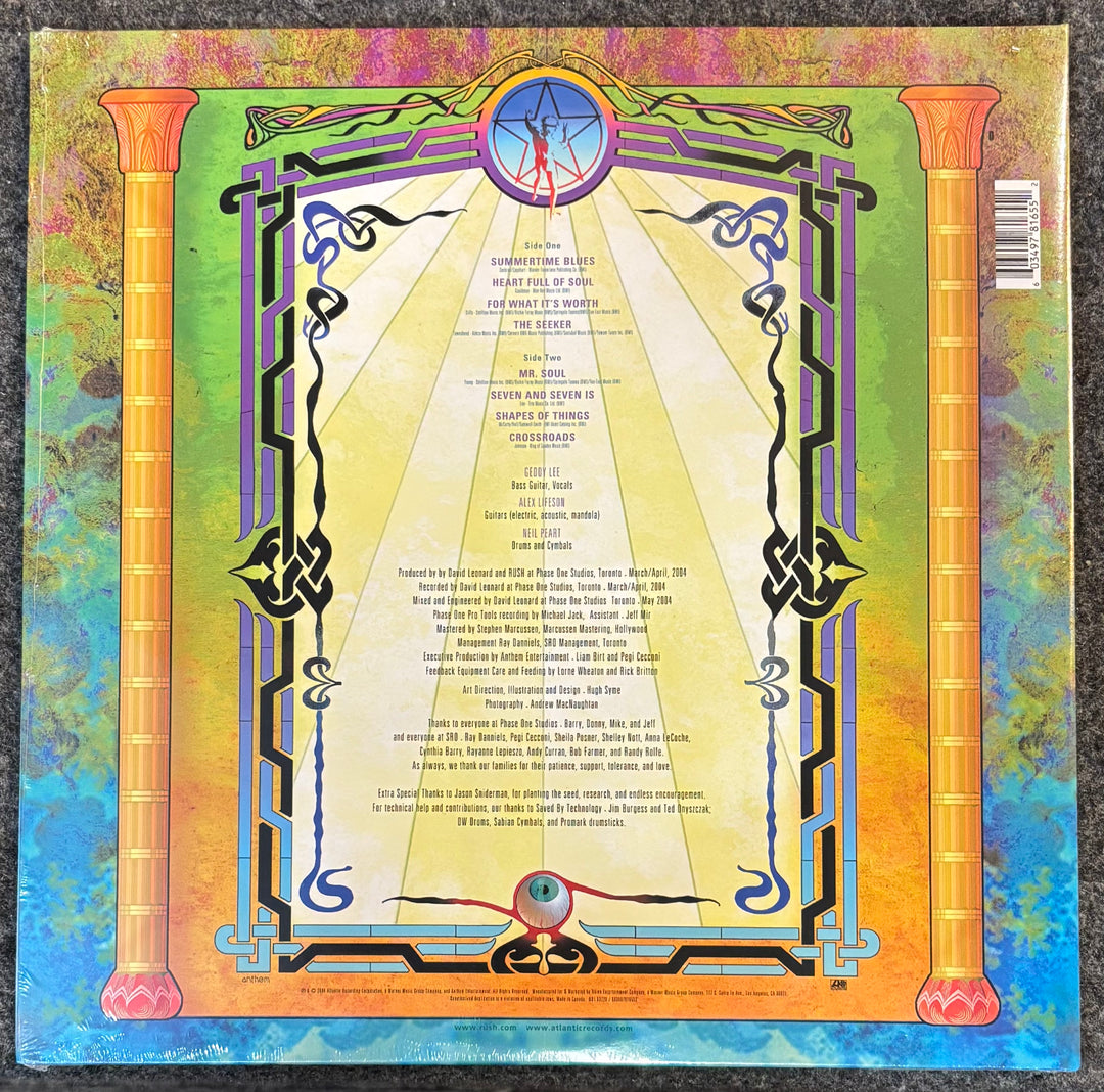 RUSH - FEEDBACK album cover with intricate designs and text