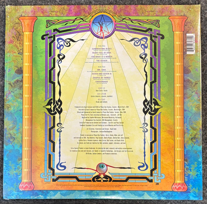 RUSH - FEEDBACK album cover with intricate designs and text