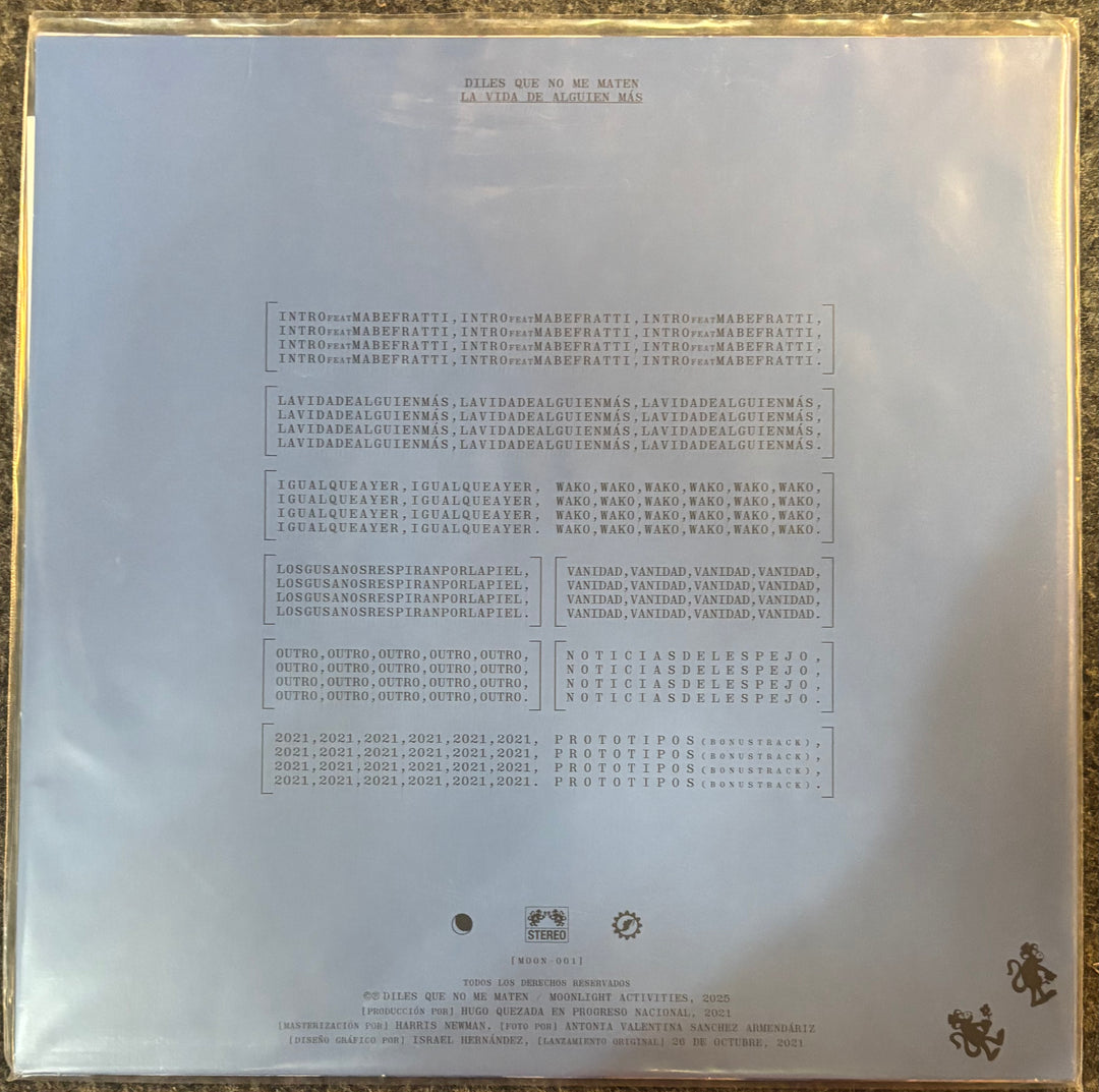 The back cover of a vinyl record sleeve for Diles Que No Me Maten - La Vida de Alguien Más