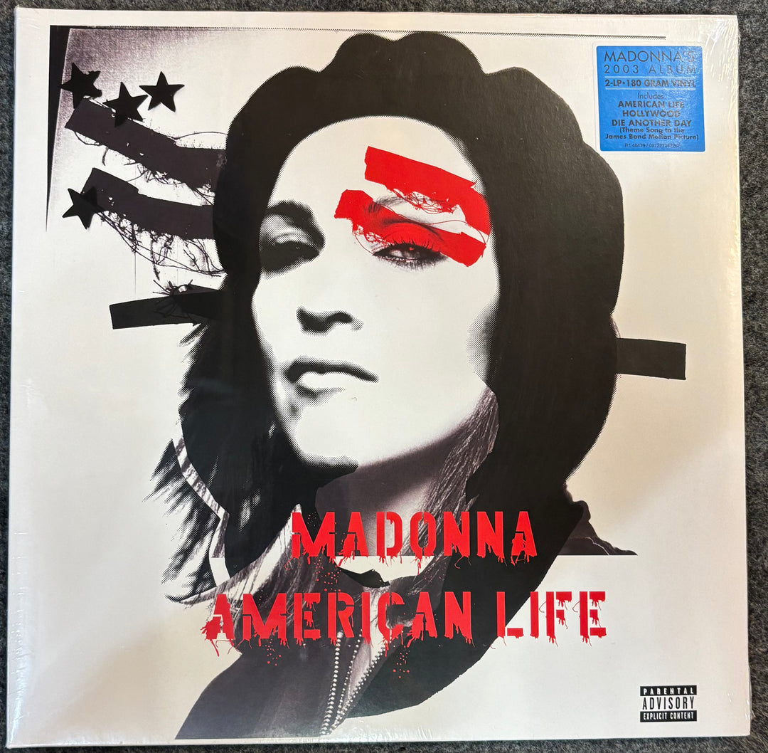 Vinyl record cover for 'American Life' by Madonna with a stylized portrait and American flag design.