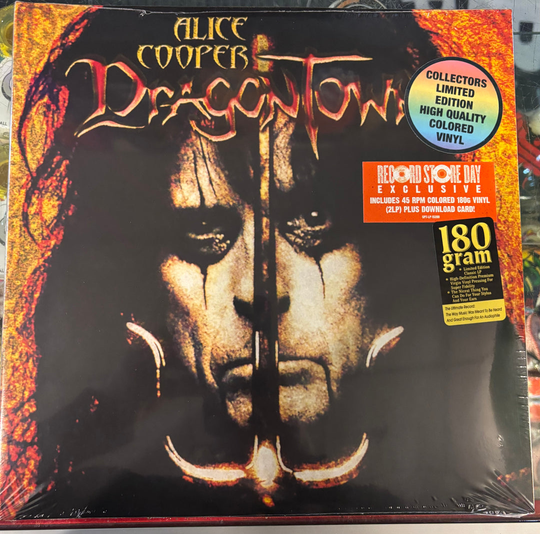 Vinyl record cover for ALICE COOPER - Dragontown with a lion design.