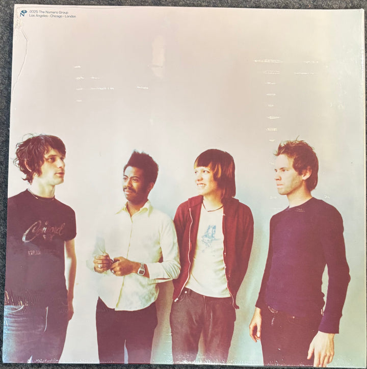 A square vinyl record cover for 90 Day Men - (It (Is) It) Critical Band + (Y2K 25th Anniversary Edition), featuring four men standing against a plain off-white background. 
