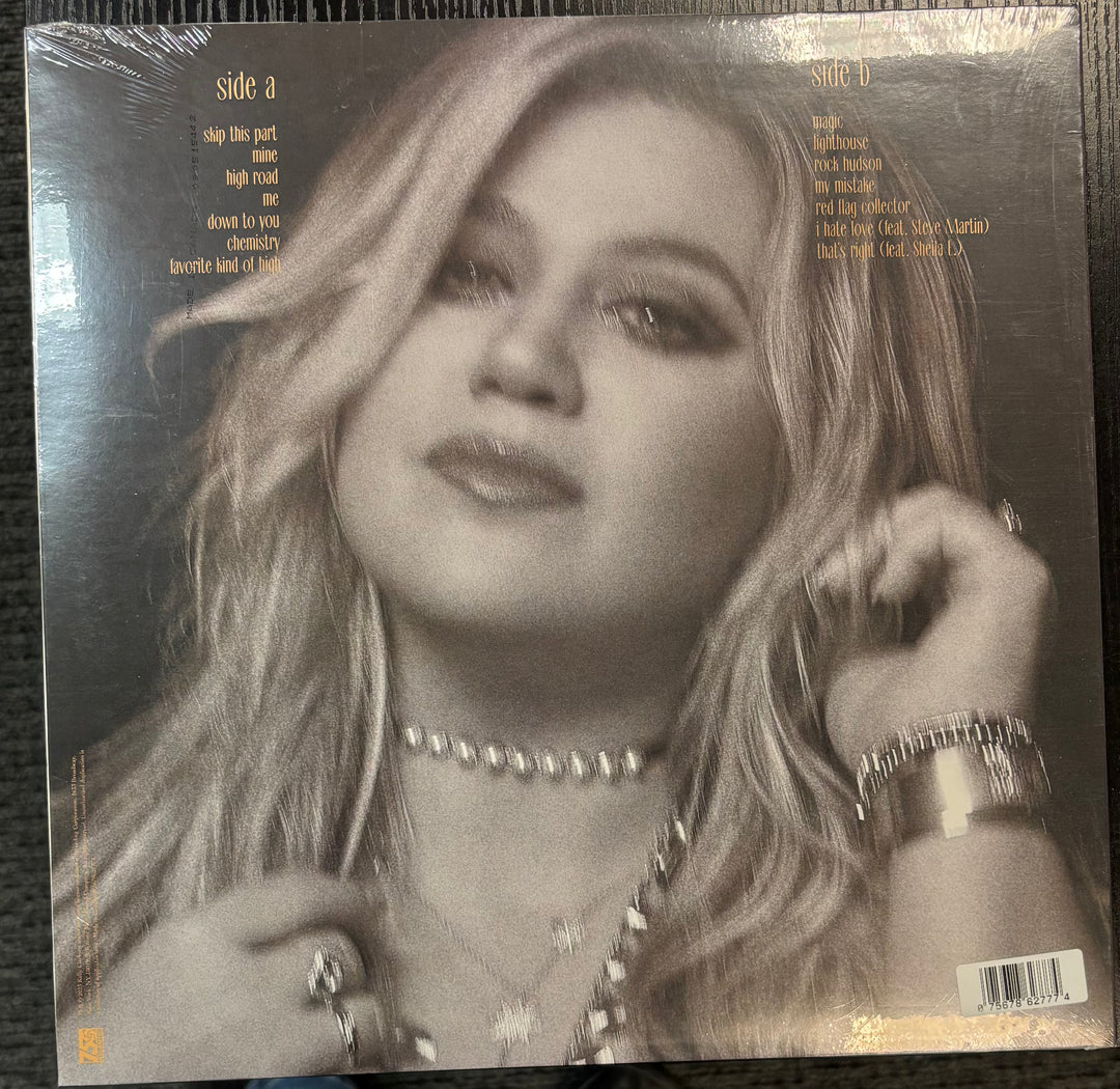 CLARKSON, KELLY - Chemistry record cover with a black and white photo of a person wearing jewelry.