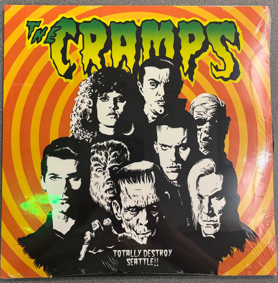 Vinyl record cover for 'The Cramps' with band members and text on a colorful background