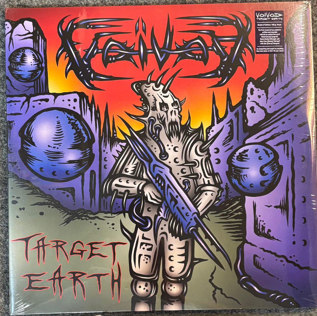 VOIVOD - Target Earth album cover with a robot and space-themed design, featuring the title 'Target Earth' and band name 'Robo'.