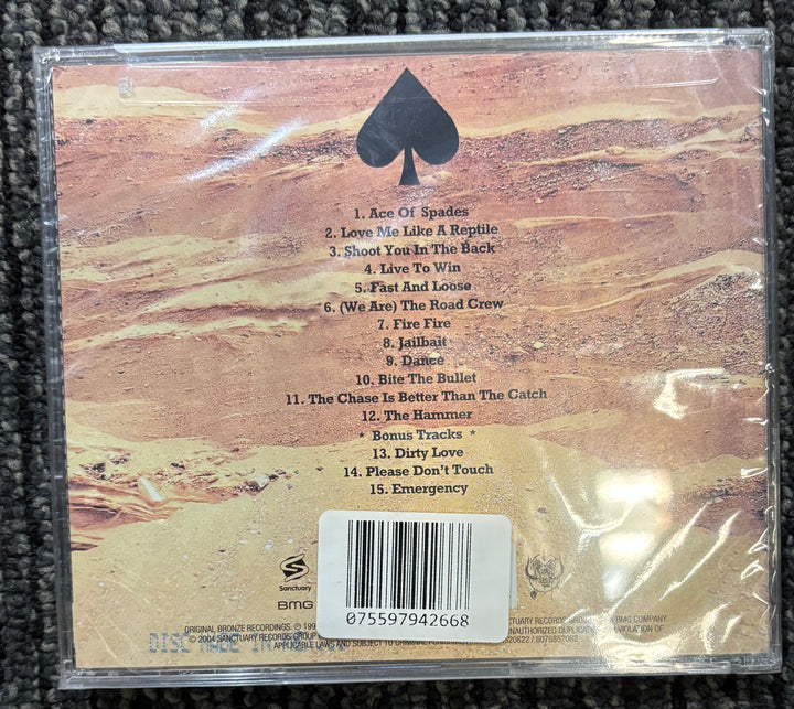 Back cover of Motorhead Ace of Spades CD with a spade symbol and tracklist on a textured surface