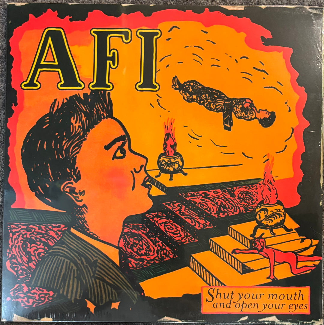 Album cover for A.F.I. – SHUT YOUR MOUTH AND OPEN YOUR EYES with a stylized illustration of a person watching a movie, surrounded by flames and text.