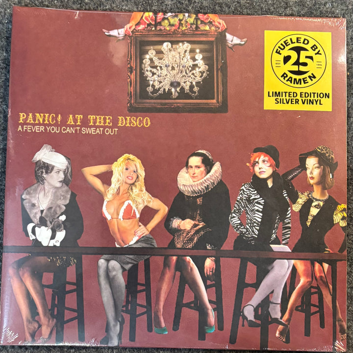 Panic! At The Disco 'A Fever You Can't Sweat Out' limited edition silver vinyl record sleeve, featuring the band members seated on stools against a dark red background with a chandelier illustration.