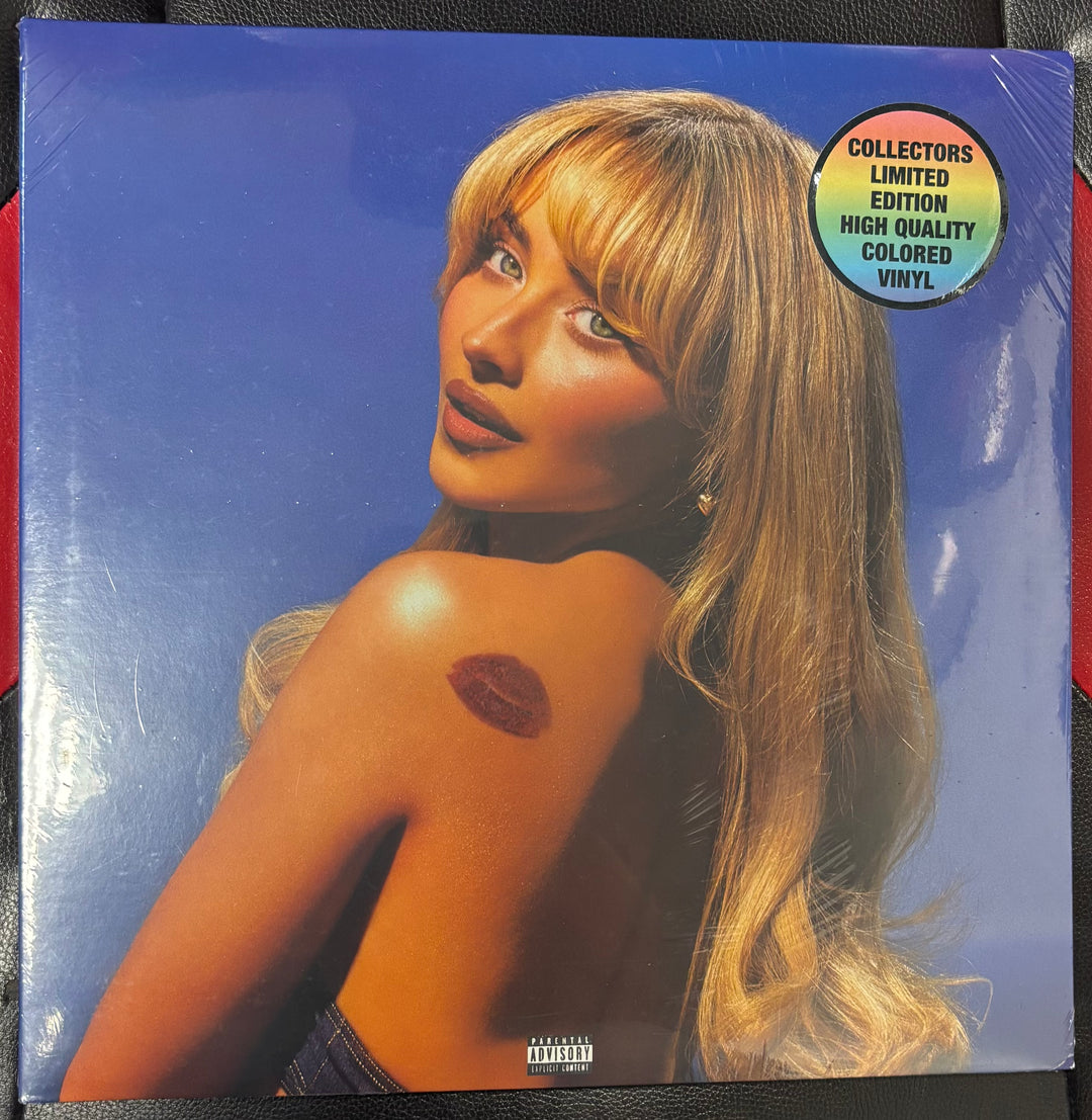 Sabrina Carpenter Short n Sweet Vinyl record cover with a person with a visible scar on their shoulder against a blue background.