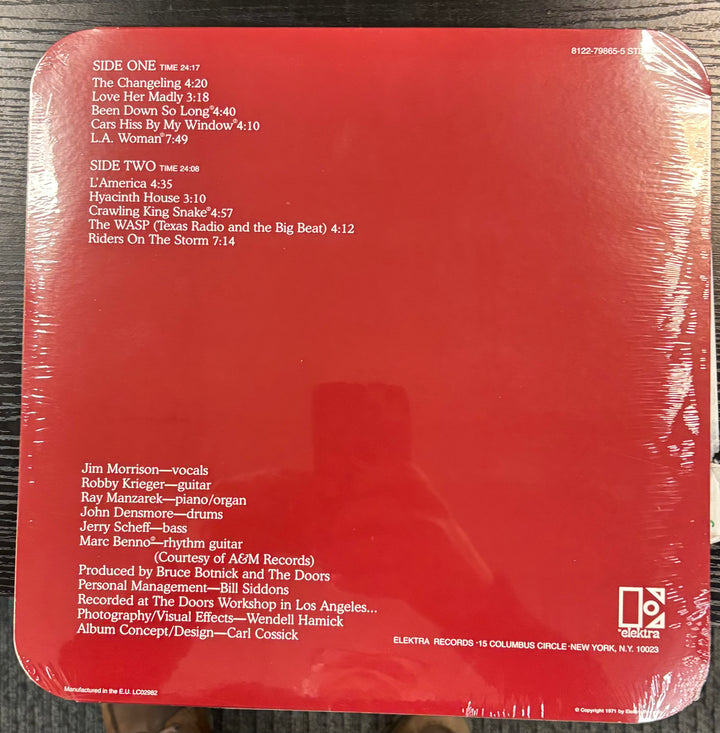 Back cover of DOORS, THE - L.A. Woman with text and album design elements.