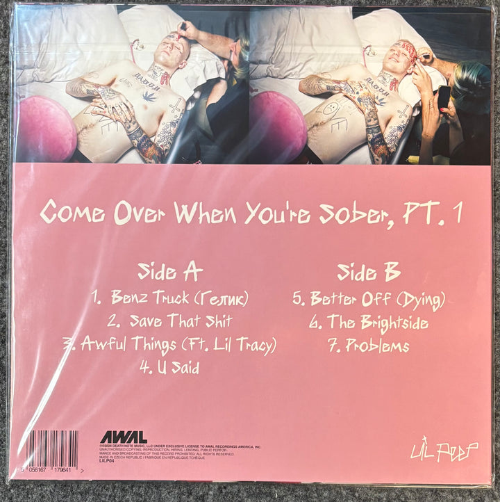 Lil Peep - Come Over When You're Sober Part 1 vinyl record LP cover, showing the back side with track listings and the AWAL record label logo on a pink background.