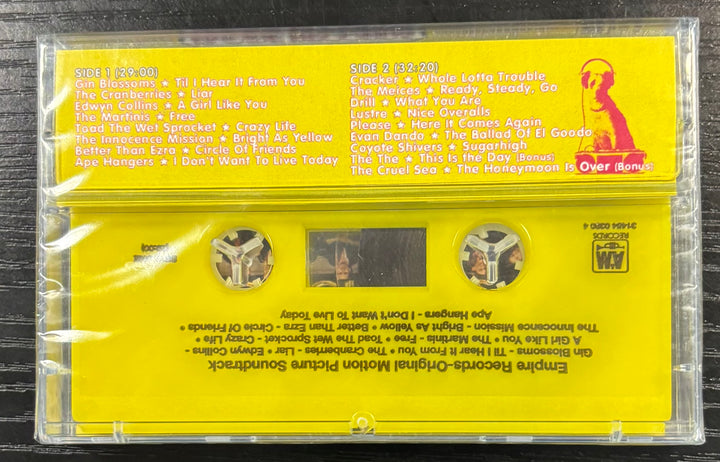 EMPIRE RECORDS Yellow cassette tape with text and a pink label on a black background