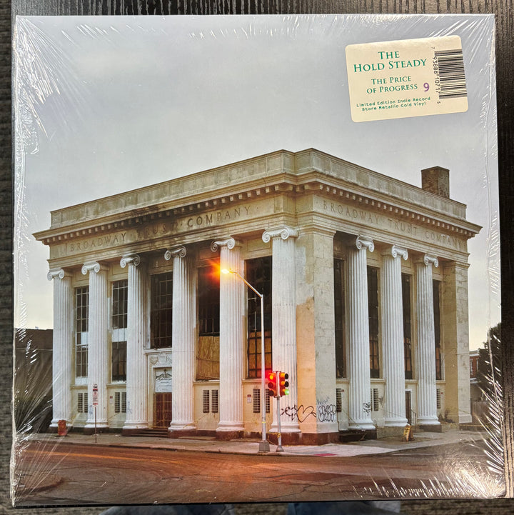 Album cover of 'The Price of Progress' by The Hold Steady featuring a classical building.