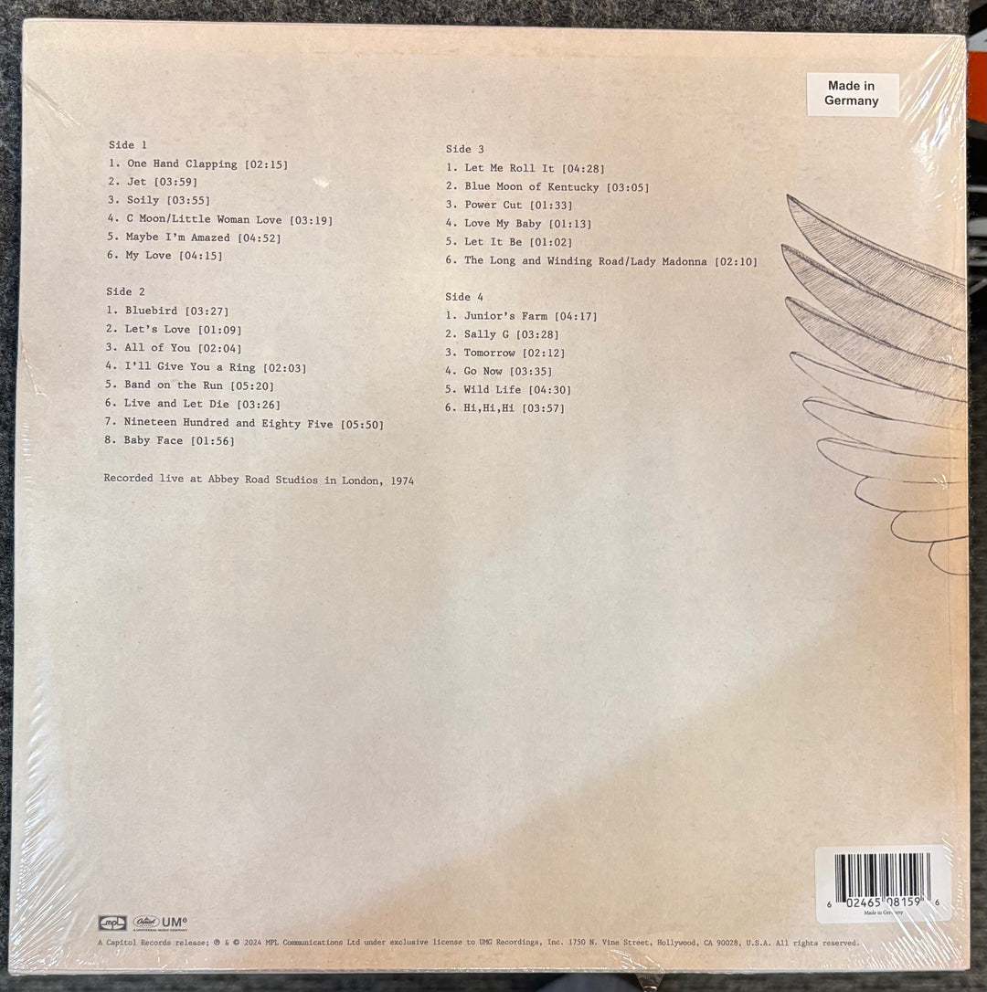 Back cover of PAUL MCCARTNEY & WINGS – One Hand Clapping with tracklist and design elements.