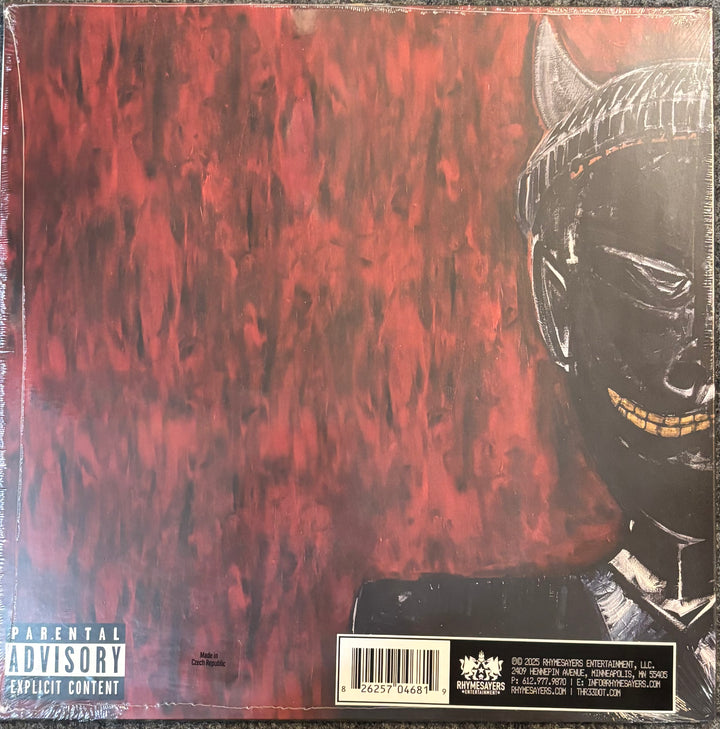 Vinyl record album cover for IDK – Even The Devil Smiles, showing a textured red background and a black hooded figure on the right, with a Parental Advisory label in the bottom left.