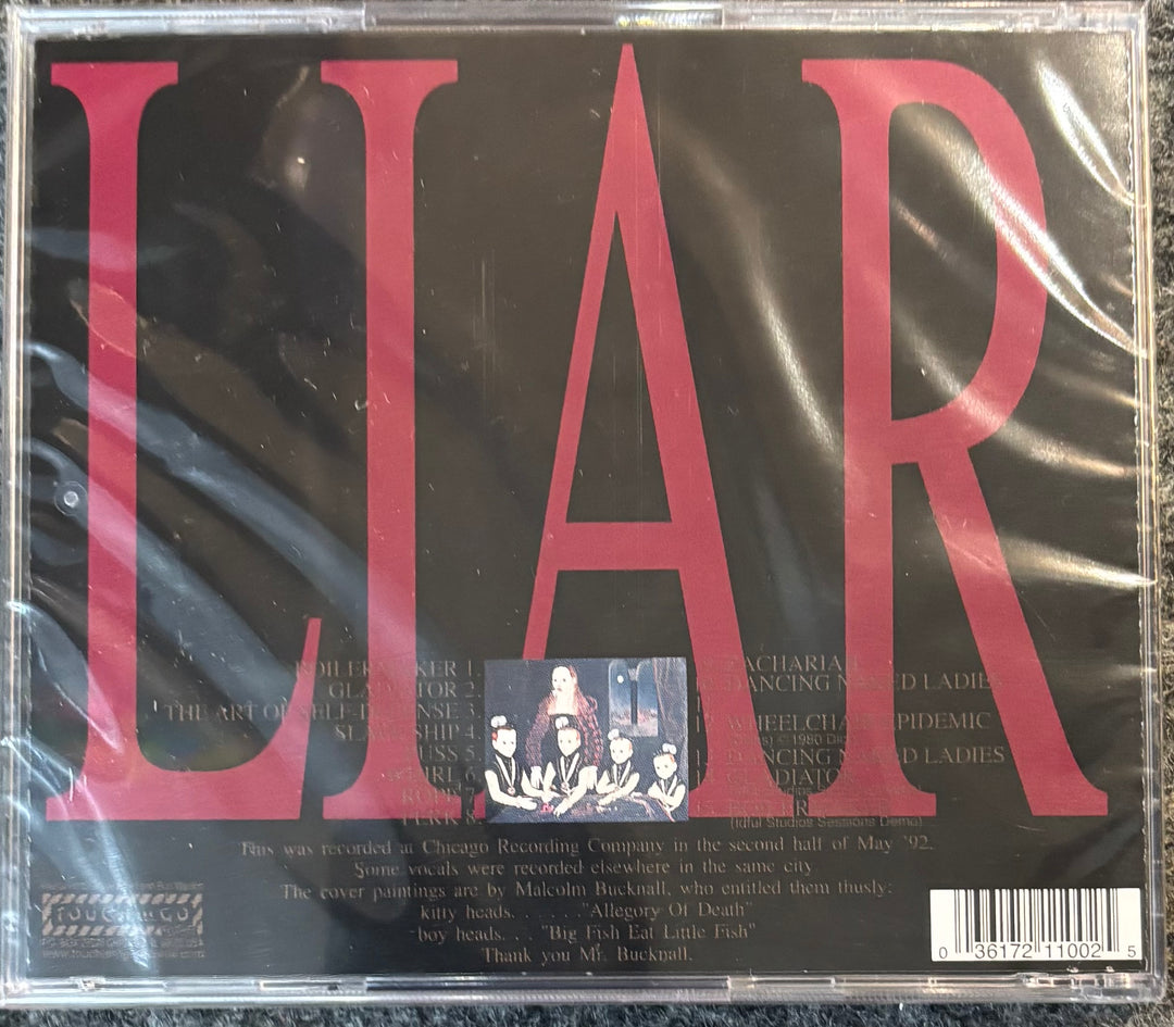 Liar CD album cover in shrink wrap, featuring large red 'LIAR' text on a black background with tracklist text and a small band photo.