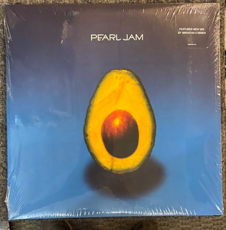 Pearl Jam album cover with avocado design on a blue background