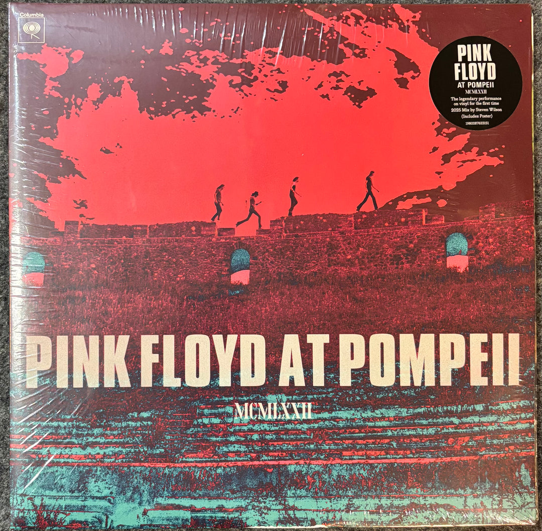 Vinyl record cover of Pink Floyd's 'Pink Floyd at Pompeii' with red and blue design.