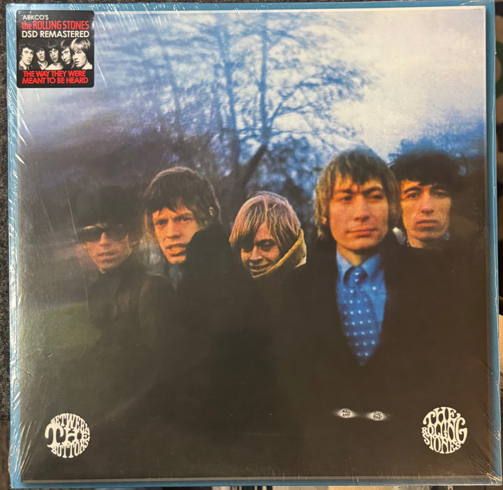 The Rolling Stones – Between The Buttons record cover with a group of people in front of trees