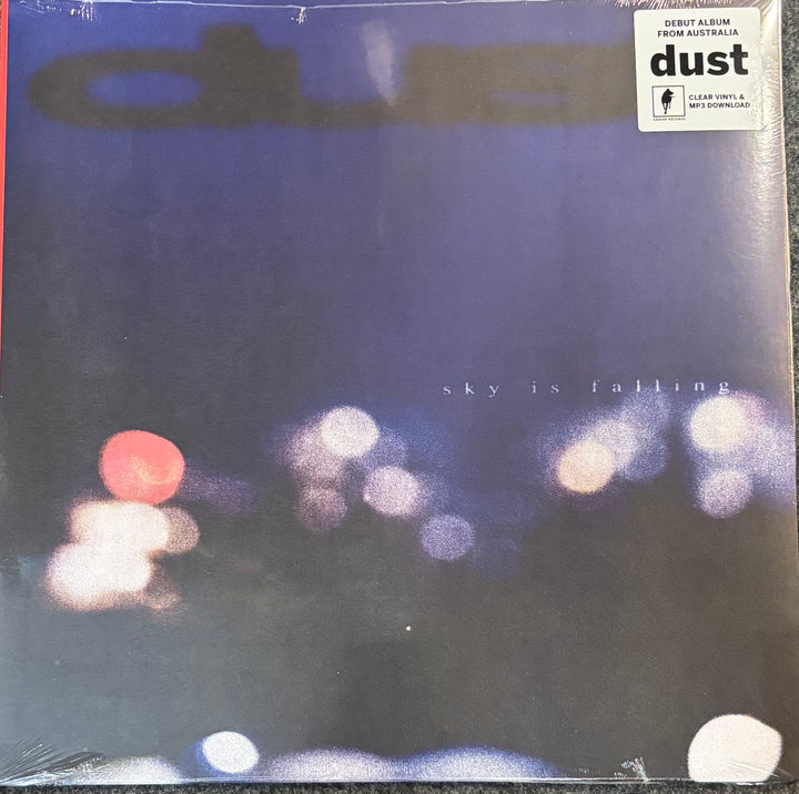Dust - 'sky is falling' 12-inch vinyl record sleeve, featuring a dark blue and black background with blurred white and red lights, and a white 'debut album from australia' sticker in the top right corner.