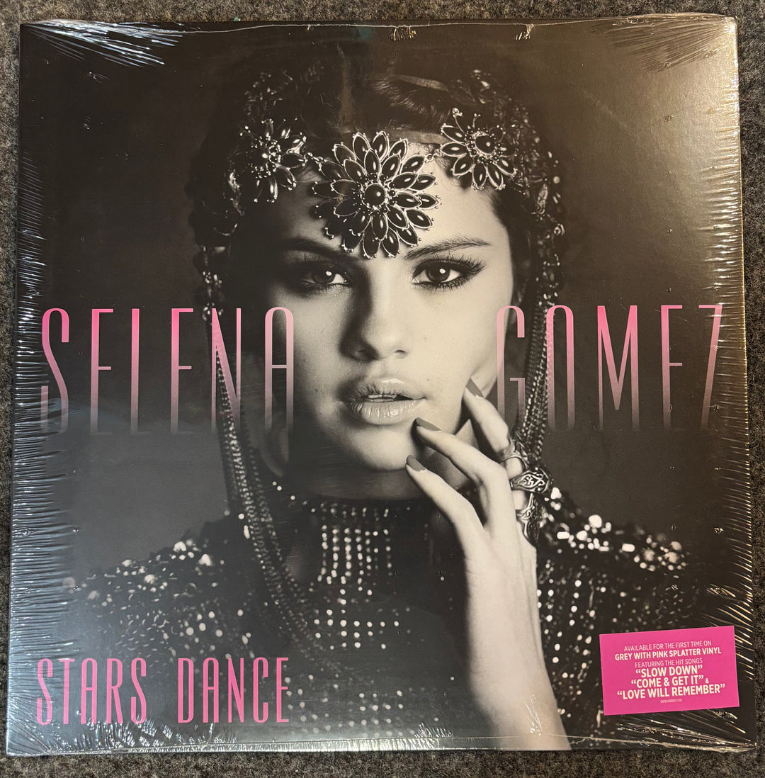 GOMEZ, SELENA - STARS DANCE Vinyl record cover featuring a stylized portrait of a woman with decorative headpiece and text 'Selena Gomez Stars Dance'.