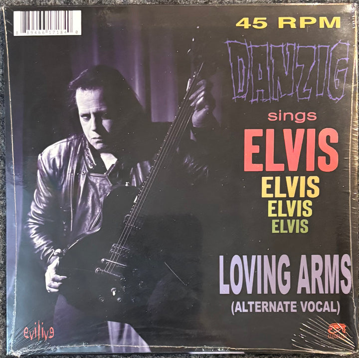 DANZIG – ALWAYS ON MY MIND 7" cover record cover featuring a person holding a guitar with text about 'Danzig' singing 'Elvis'.