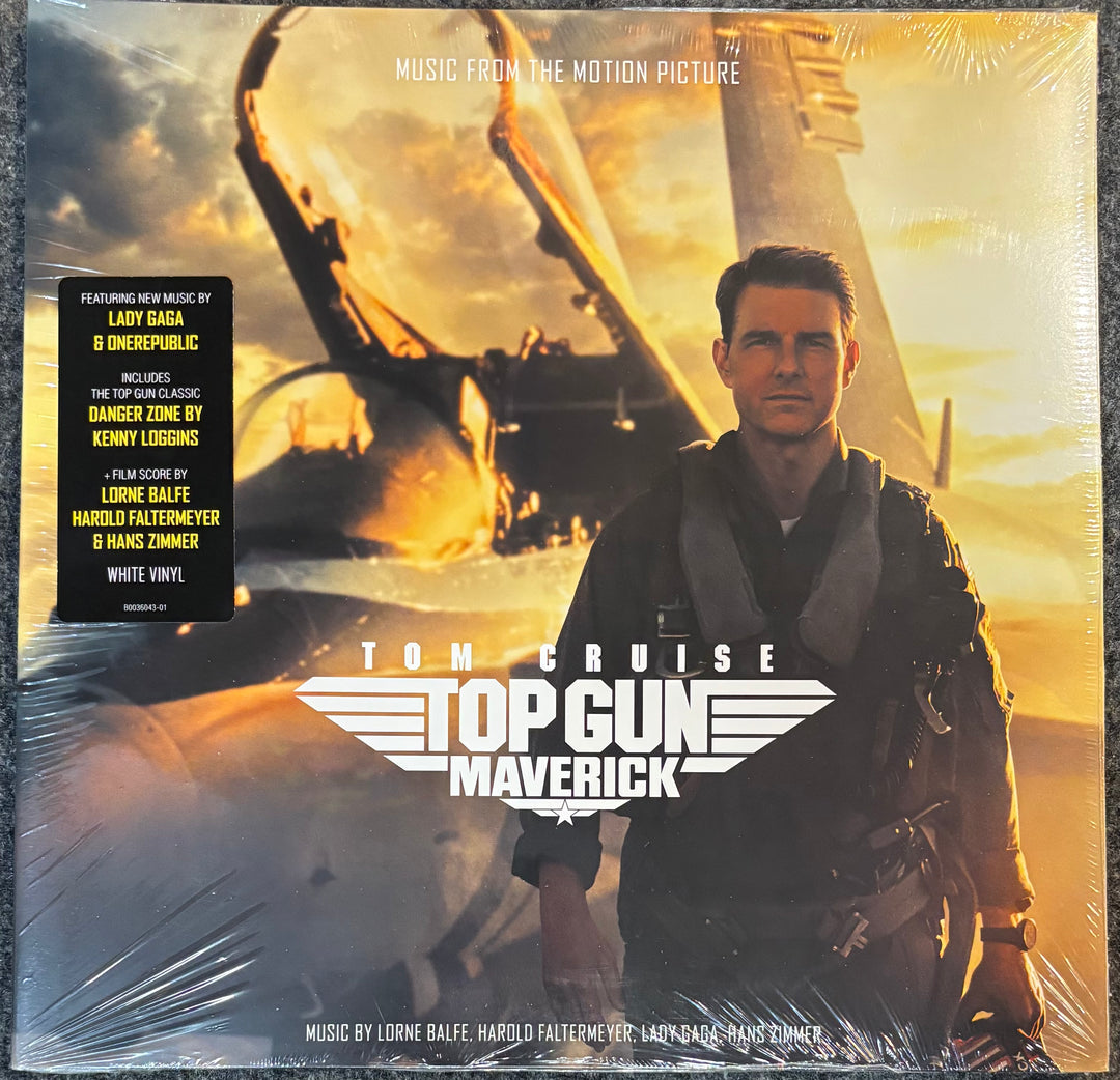 Top Gun Maverick original motion picture soundtrack on white vinyl, sealed in shrink wrap. The cover art features Tom Cruise in a flight suit against a sunset background with a fighter jet, and a black sticker on the left highlighting featured new music.