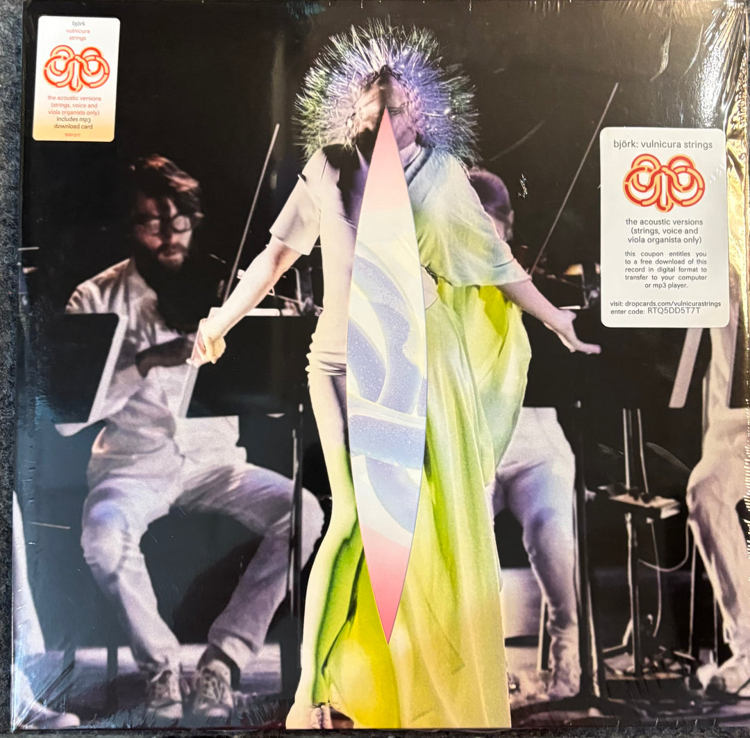 Bjork - Vulnicura Strings record cover with a person in a colorful dress and another person playing an instrument.