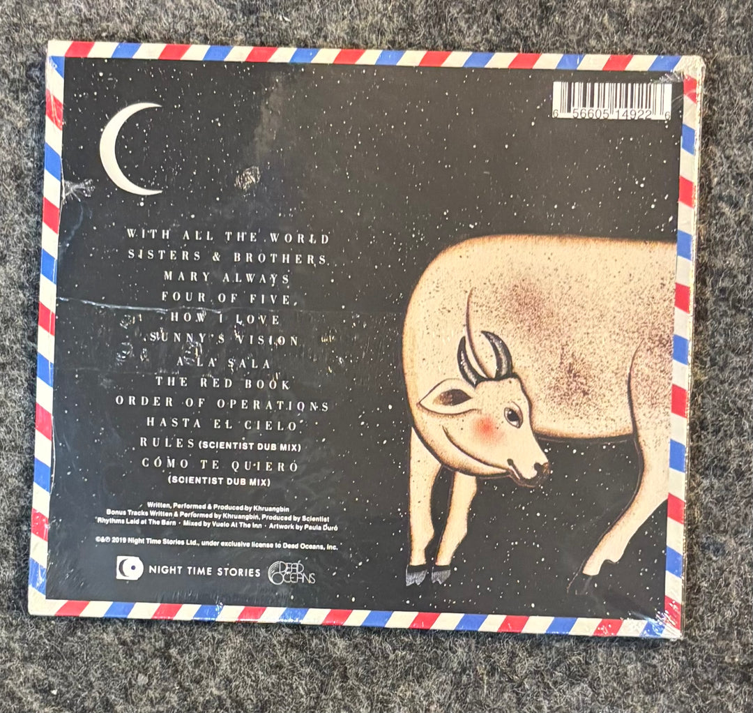 KHRUANGBIN – HASTA EL CIELO CD back cover with bull illustration and text on a textured surface