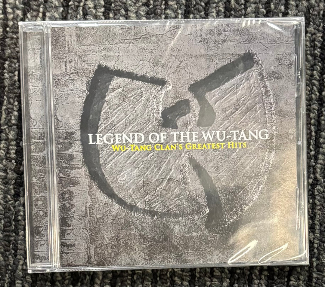CD cover of 'Legend of the Wu-Tang' by Wu-Tang Clan on a textured surface