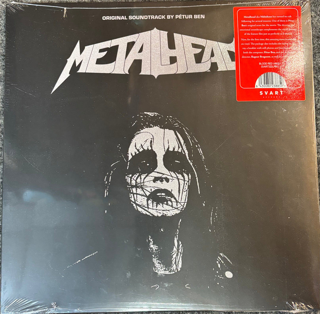 Vinyl record cover for 'Metalhead' with a black and white illustration of a person and the album title.
