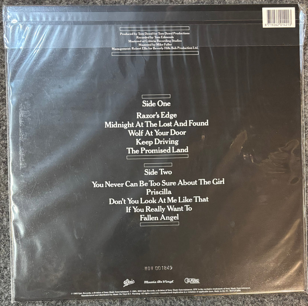 Back cover of Meat Loaf – Midnight At The Lost And Found with track listings and album details.