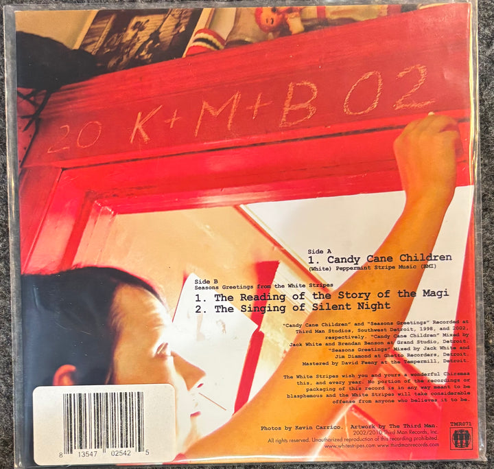Back cover of WHITE STRIPES, THE - MERRY CHRISTMAS FROM...  with text and a barcode