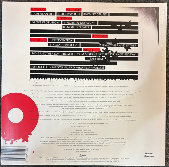 Back cover of MADONNA – AMERICAN LIFE with text and a red label