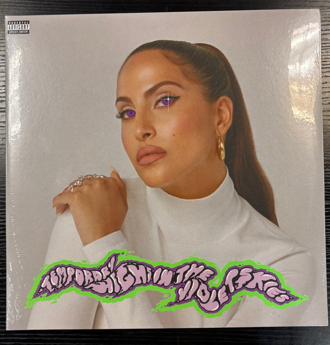 SNOH AALEGRA - TEMPORARY HIGHS IN THE VIOLET SKIES vinyl record cover with a person wearing a white turtleneck