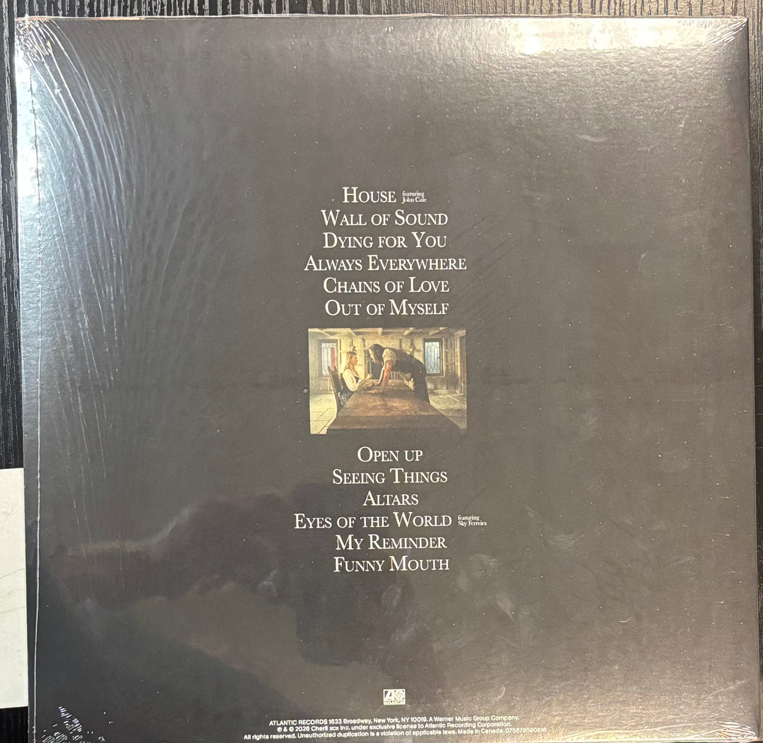 CHARLI XCX - WUTHERING HEIGHTS record cover with text and a small illustration of two people sitting together.