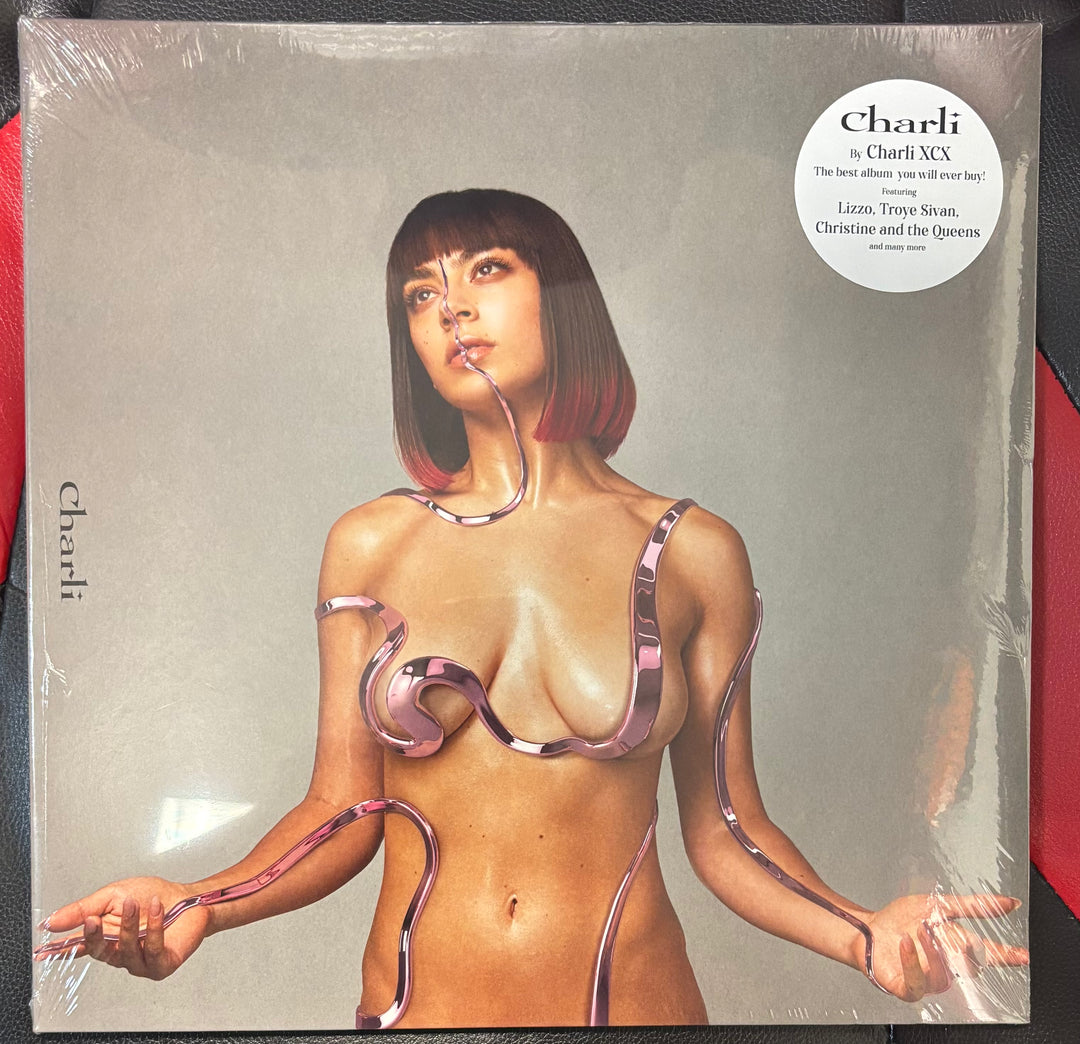 CHARLIE XCX - Charli Vinyl record cover with a stylized image of a person and the word 'Charli'.