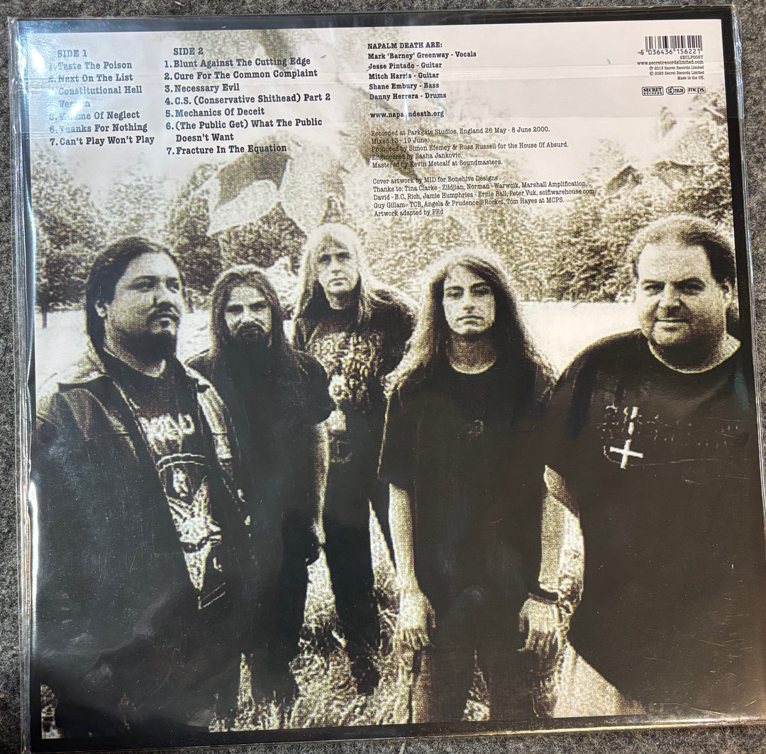 Album cover with a group of people in a natural setting, featuring text on the left side.