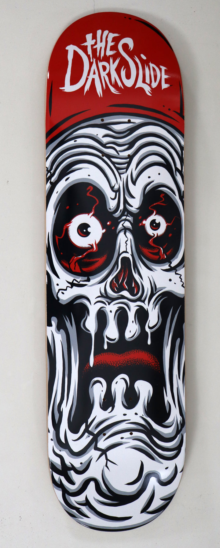 The Dark Slide x Tim Baron "Ghoul Skull" Skateboard Deck