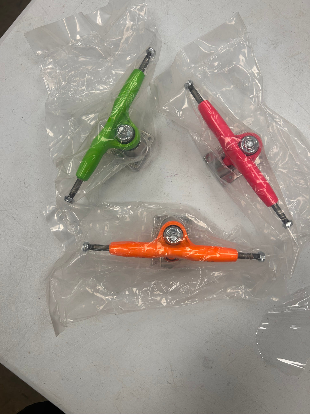 Gullwing Pro III Neon Pink / Silver 9" Skateboard Trucks