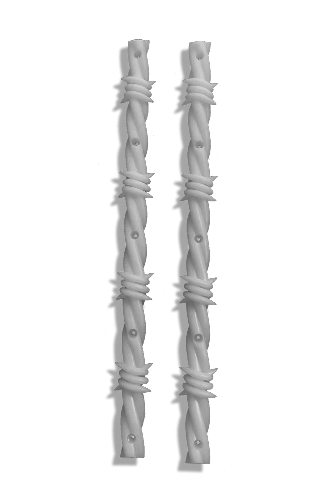 Two gray barbed wire sculptures on a white background