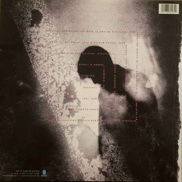 Album cover with a silhouette of a couple embracing, featuring text and a bar code.