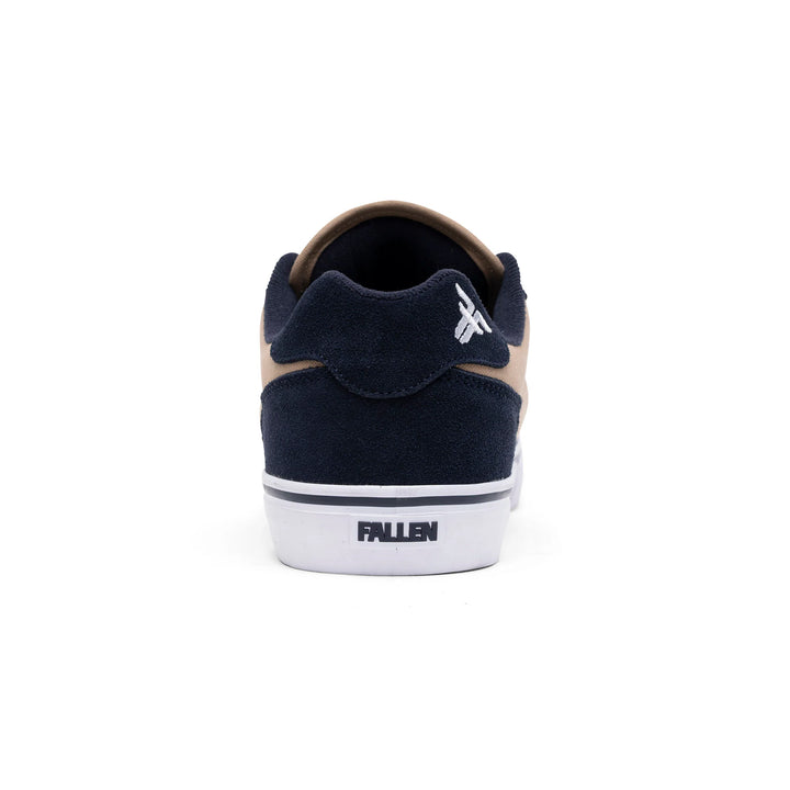 Navy and beige sneaker with 'Fallen' branding on a white background