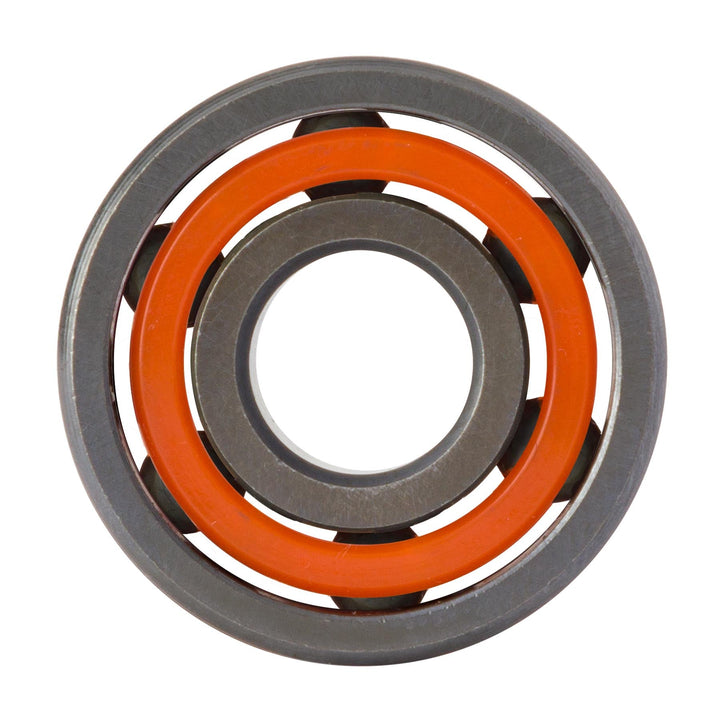 Reverse face of a Bronson Six Ball RAW bearing with its orange nylon cage.