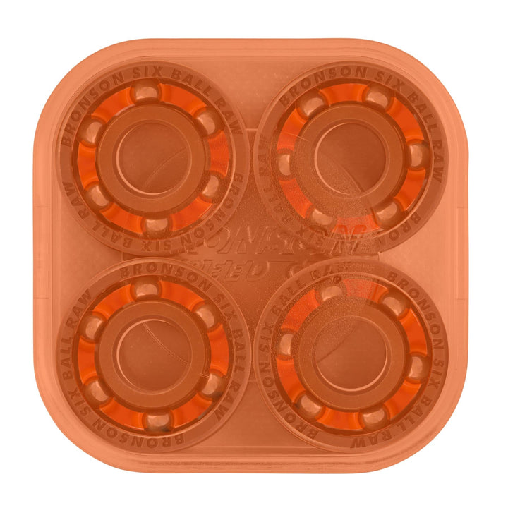Six Ball RAW bearings visible through the translucent orange Bronson package.